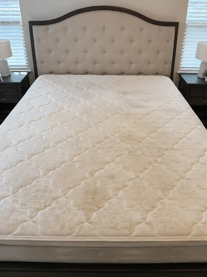 Mattress with stains and discolouration before deep cleaning